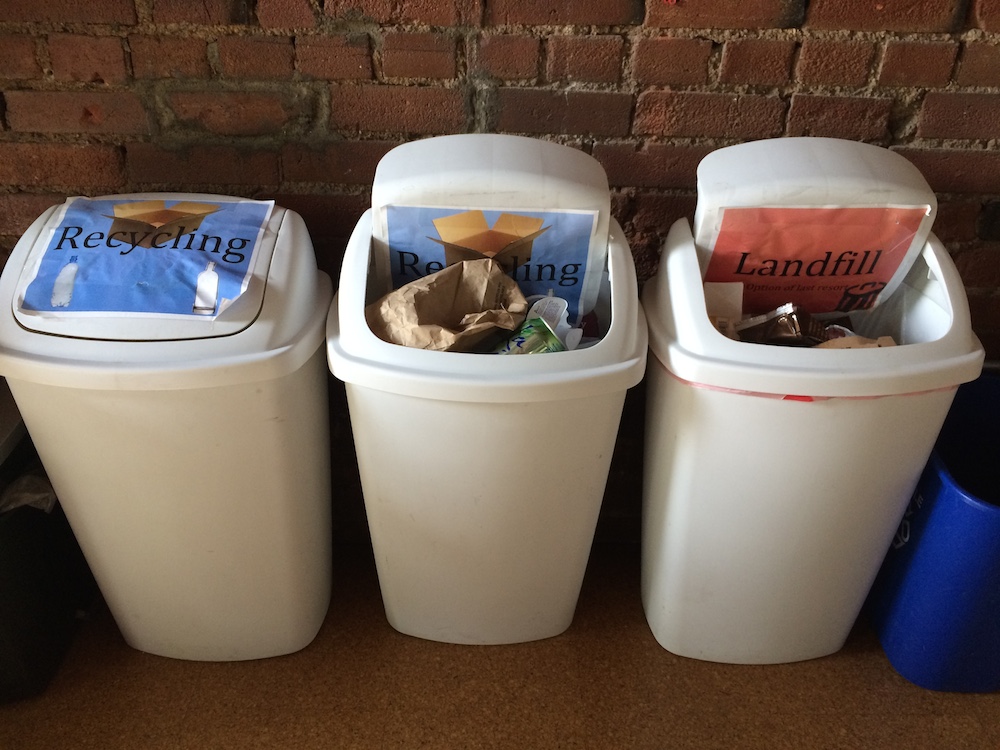 These containers overflowing with trash earn an appearance level score of 4, for moderate dinginess.